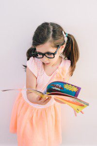 Zest Foto Testimonials Girl with glasses reading